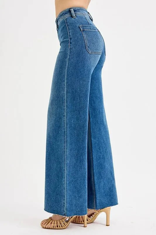 Side view: medium wash wide-leg jeans with front patch pocket