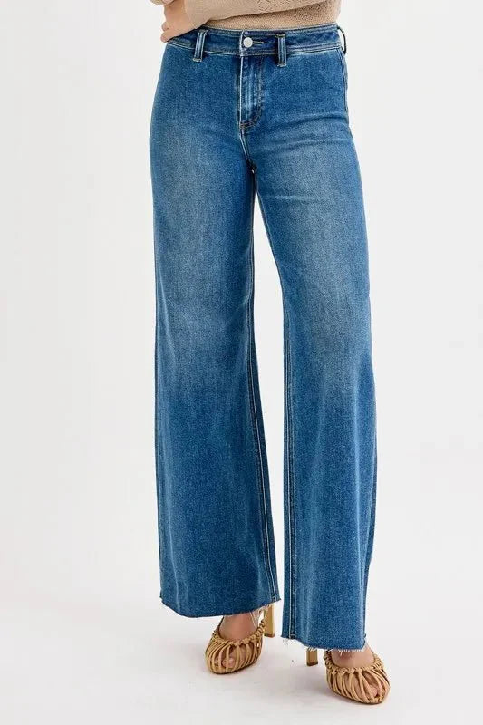 Back view: high-waisted wide-leg jeans in medium wash denim, belt loops