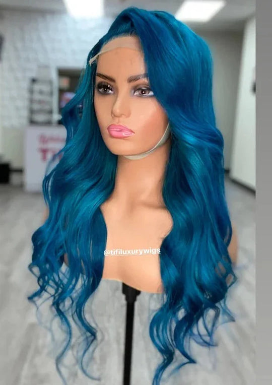 Brianna wig, side view: deep teal long wavy hair with middle part