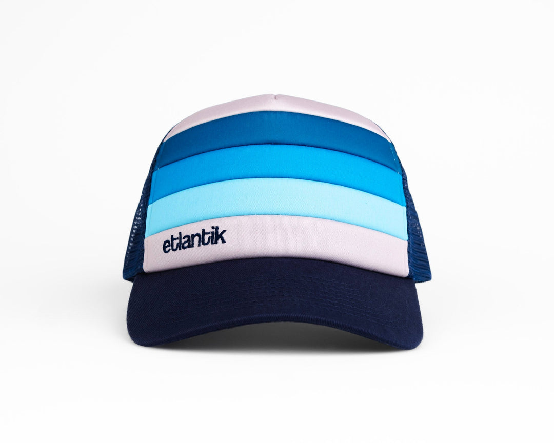 Swell Cap Blue: navy cap with light-blue stripes and etlantik logo patch front.