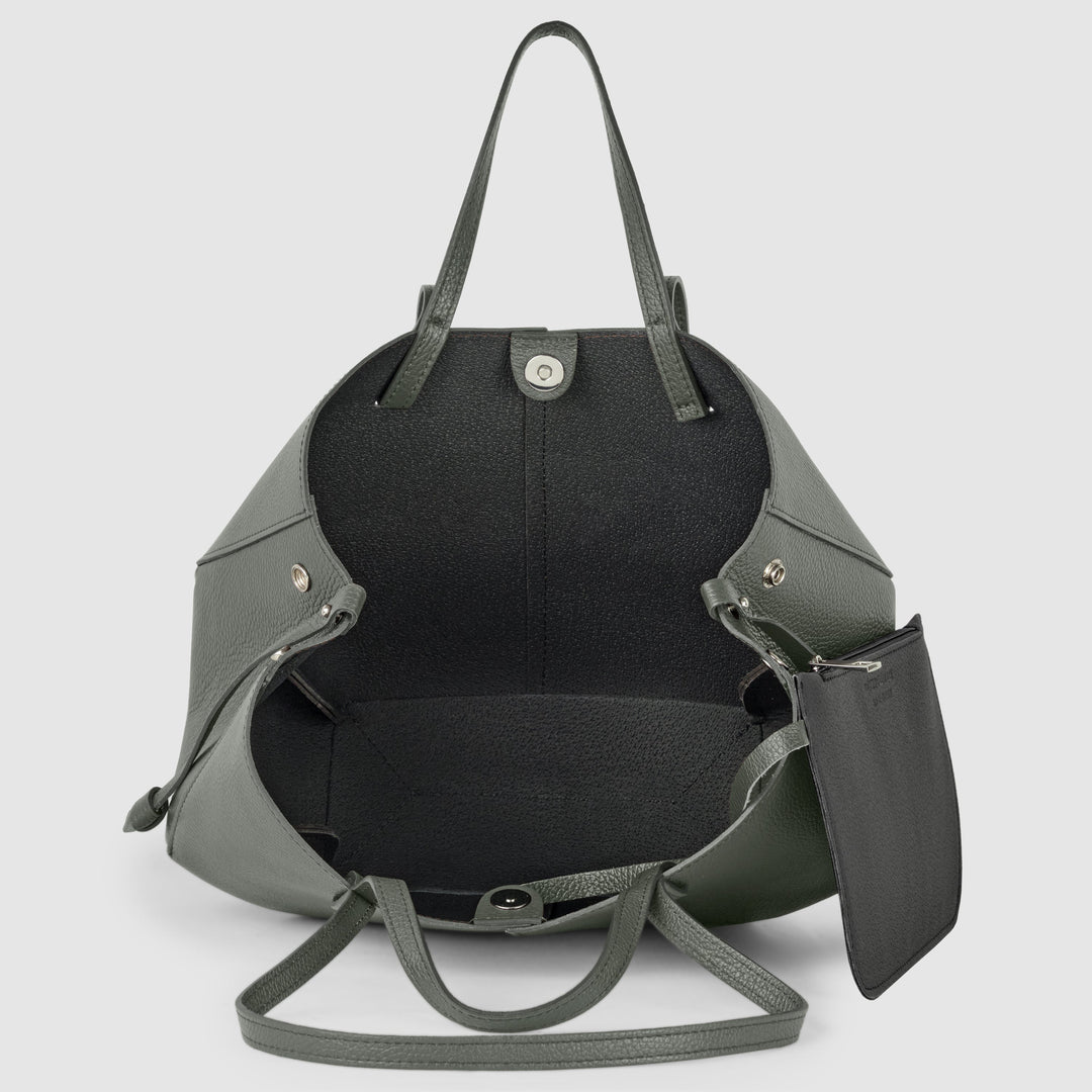 Tote bag opening with dark interior lining and top clasp, dark grey calf leather.