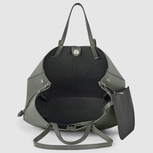 Tote bag opening with dark interior lining and top clasp, dark grey calf leather.