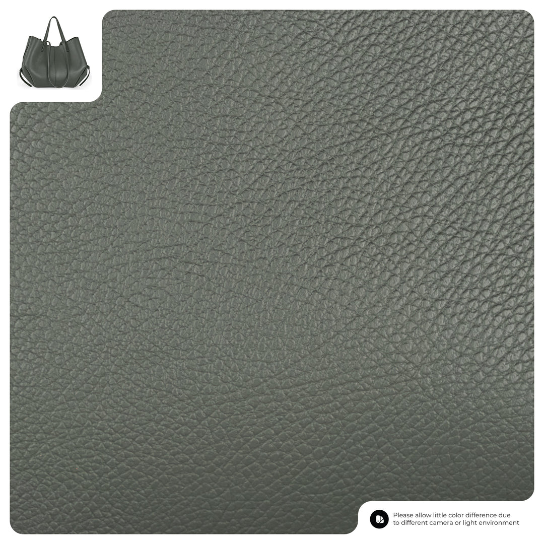 Dark grey grained calf leather texture close-up for tote bag material.