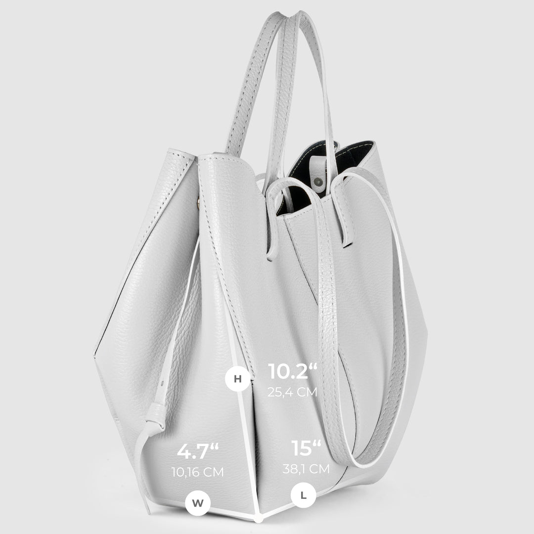 White leather tote bag with dual handles and open top; side panel and lining