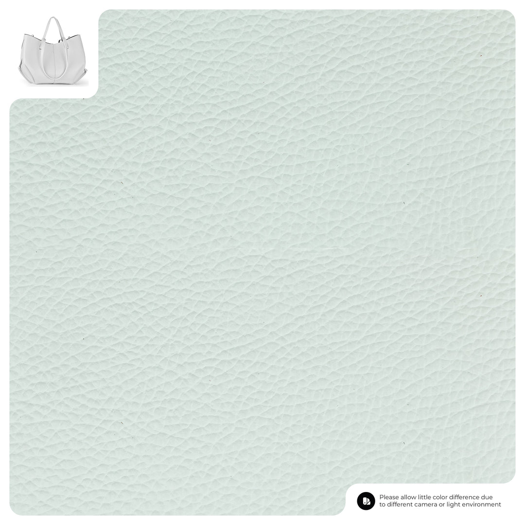 Light mint textured calf leather tote bag close-up of pebbled grain