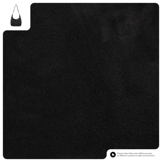 Black suede fabric close-up with fine grain texture