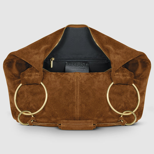 Brown suede hobo bag interior view with front zipper pocket, gold hardware, and ring handles
