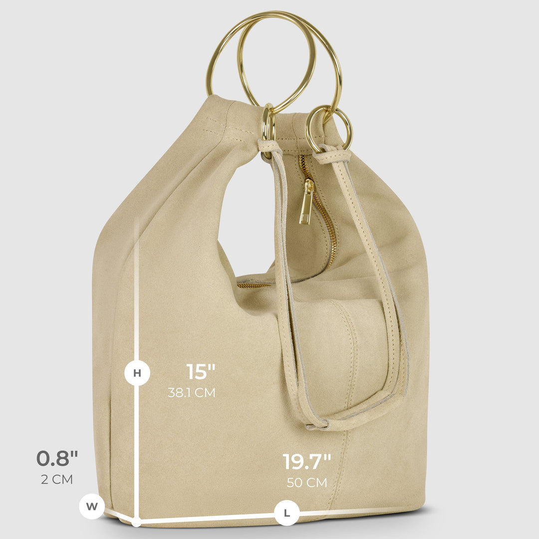 Beige suede hobo bag side view with measurements and ring handle straps