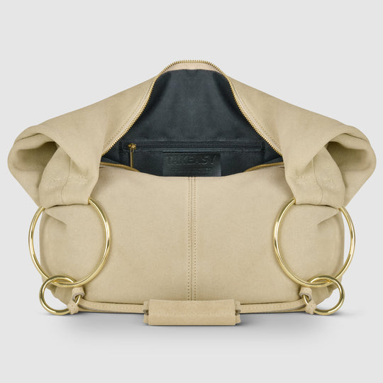 Beige suede hobo bag interior view with zip pocket and gold zipper
