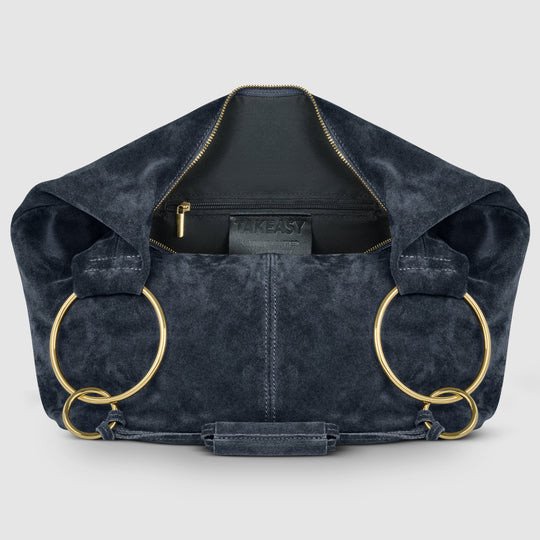 Dark blue suede hobo bag interior view with zip pocket and gold zipper