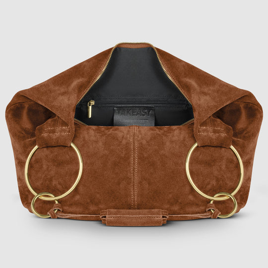 Chocolate suede hobo bag with zip-top opening and interior brand label