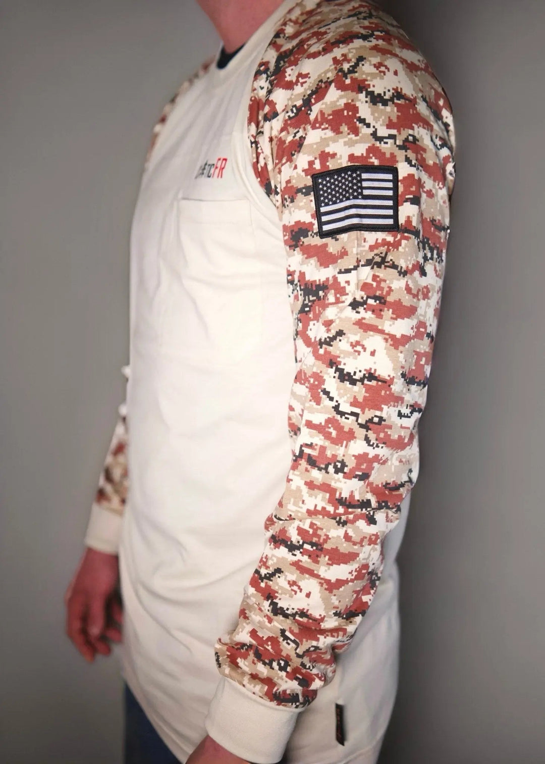 Tan/black digital camo long-sleeve shirt with white body and flag patch on sleeve