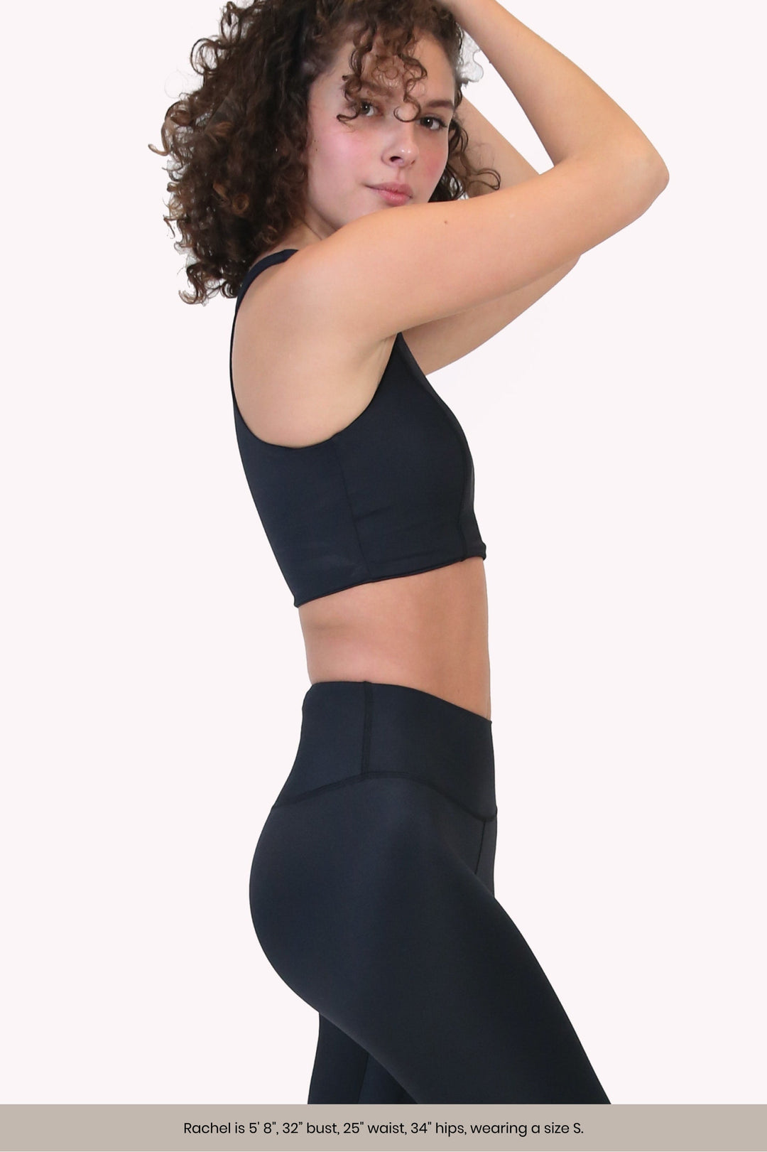 the classic renew bra in dark black, side view of racerback sports bra