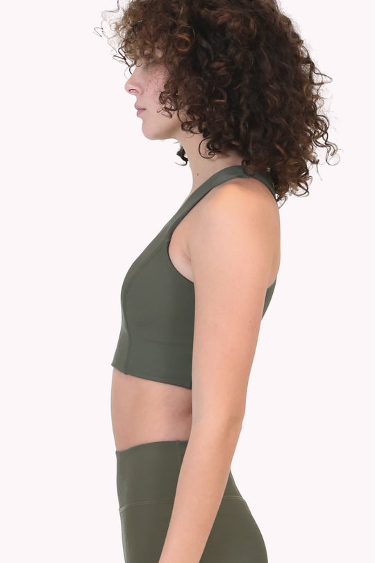 Jade green the classic renew bra, side profile of racerback sports bra