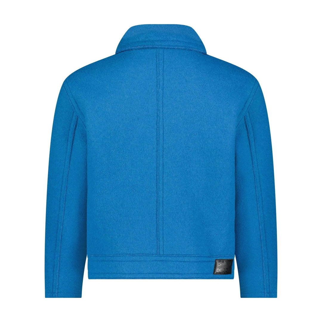 Blue boxy jacket back close-up: plain back yoke seam, hem band with small logo