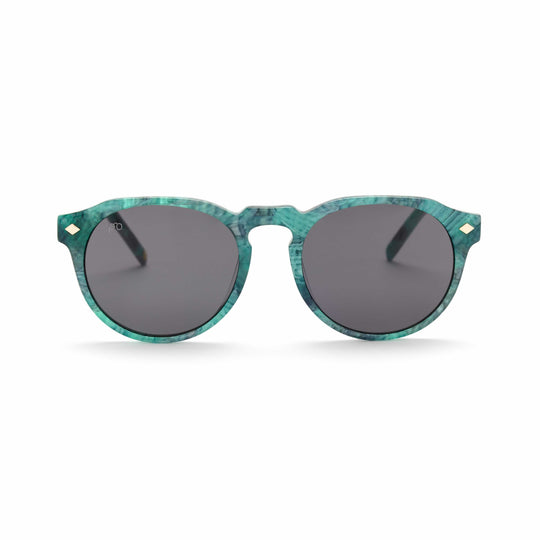 Tribe sunglasses in Iceberg Jade teal frame with dark smoke lenses, rounded cat-eye