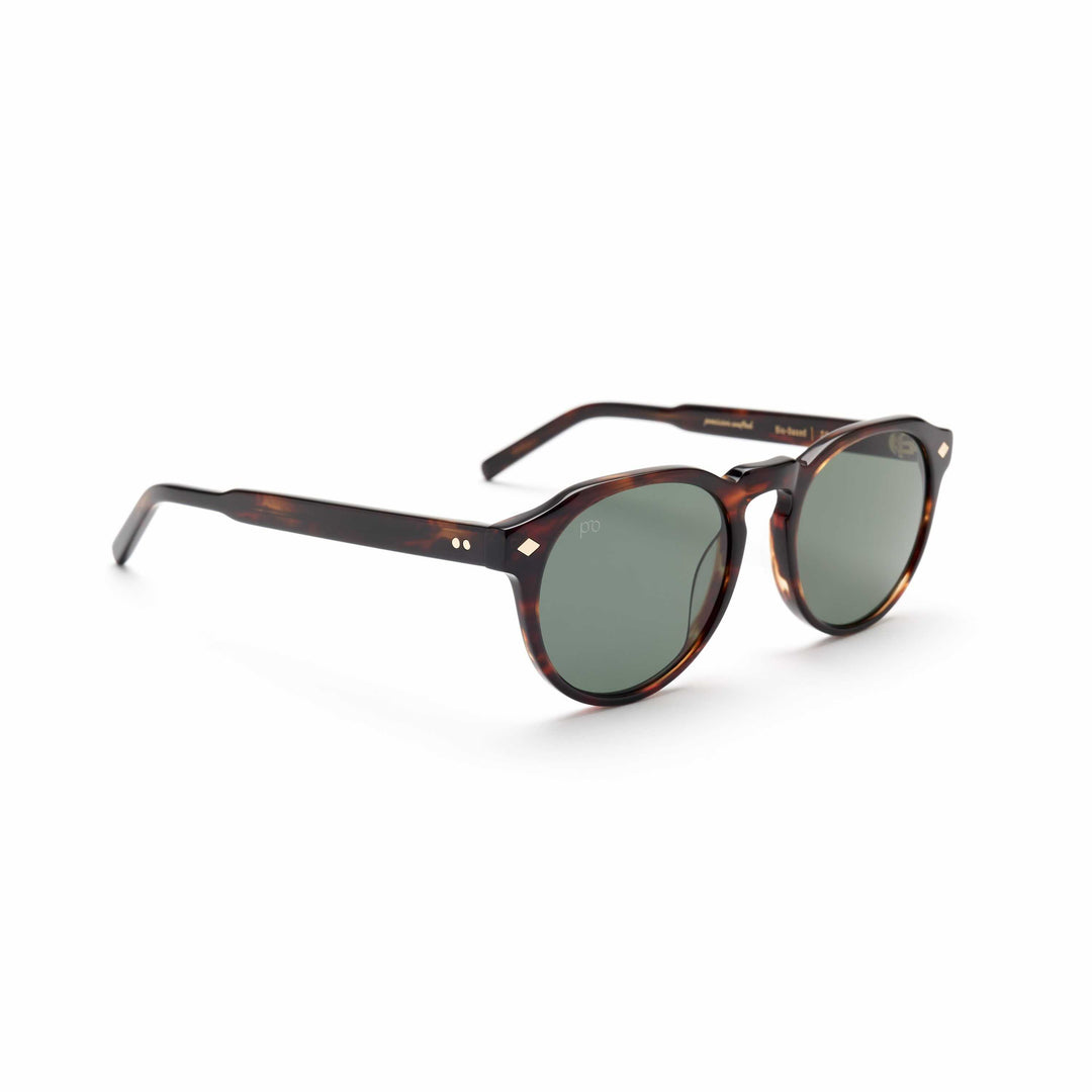 Tortoiseshell Tribe sunglasses, angled view with green-tinted lenses