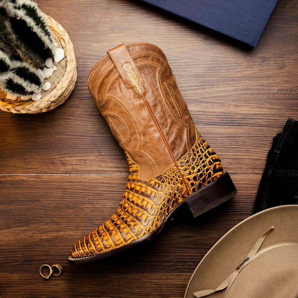Tucson Mustard/Brown cowboy boots angled on floor, stacked heel and shaft detail