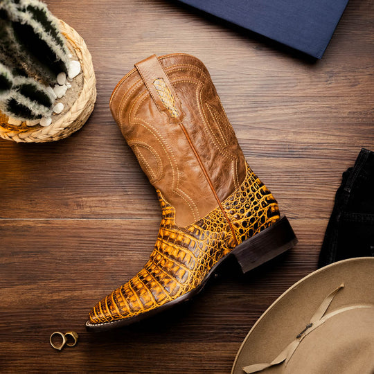 Tucson Mustard/Brown cowboy boots angled on floor, stacked heel and shaft detail