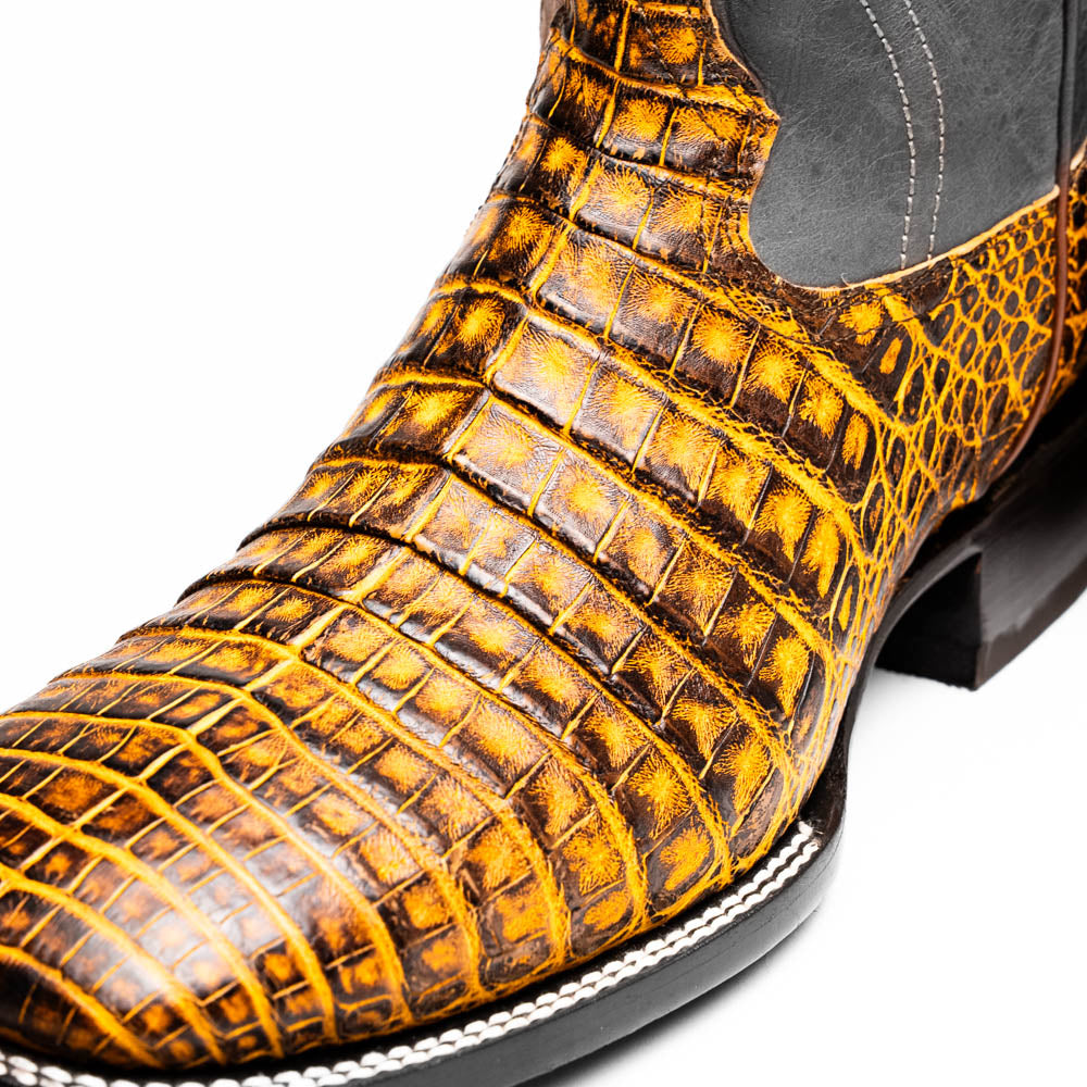 Tucson Mustard/Brown boot upper close-up with lattice stitching and textured leather