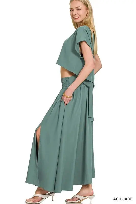 Side view: Ash Jade crop top with dolman sleeves and high-waist flowy maxi skirt